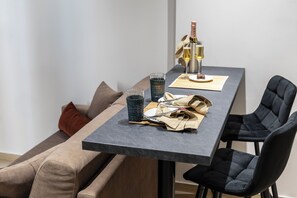 Deluxe Quadruple Room | Dining - DOMIOS Suites Athens (Athens)