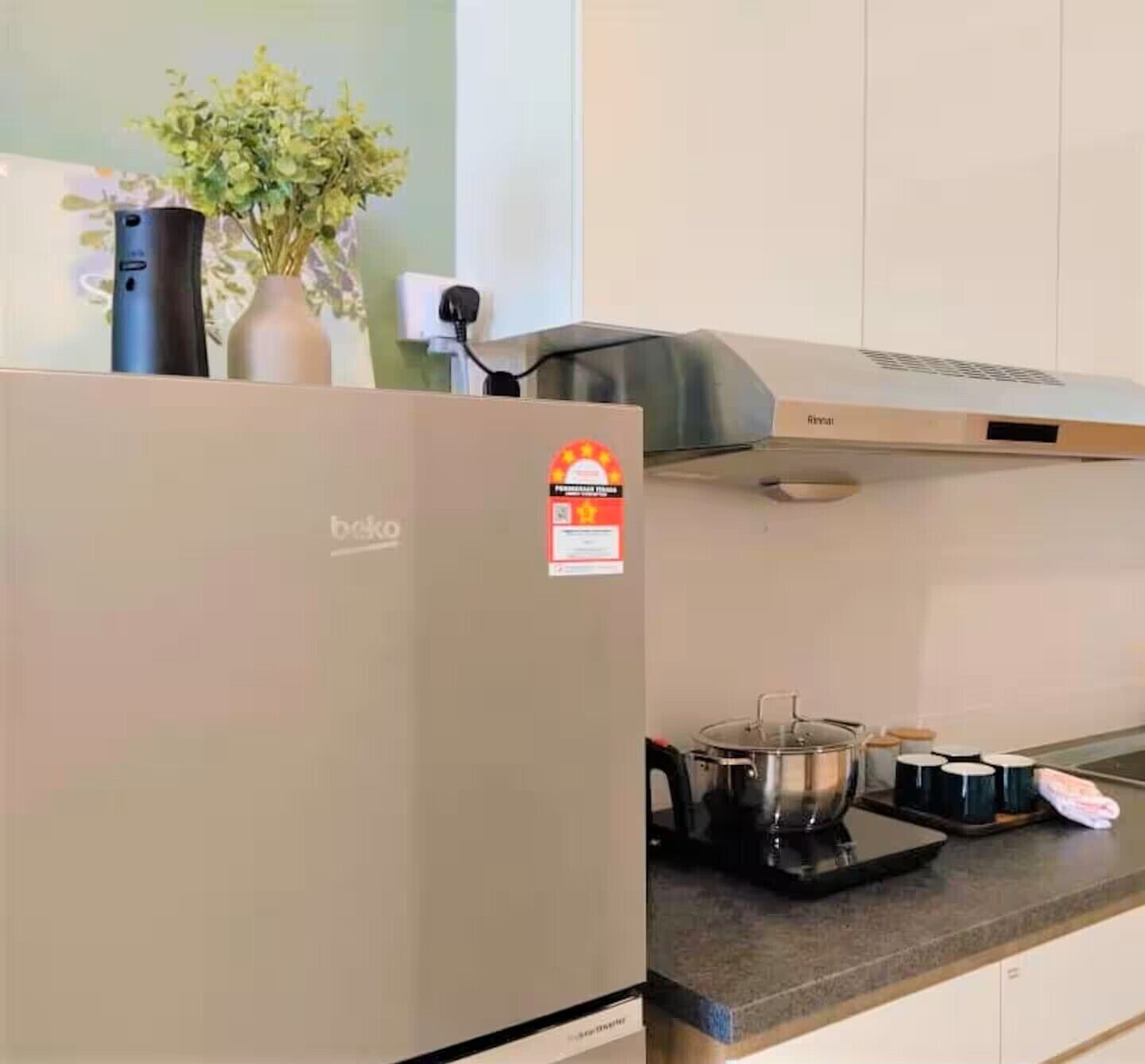 Fridge, stovetop, electric kettle, cookware/dishes/utensils