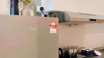 Fridge, stovetop, electric kettle, cookware/dishes/utensils