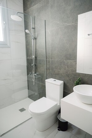 Shower, hair dryer, towels, soap - Superior One Bedroom Apartment (Agia Napa)