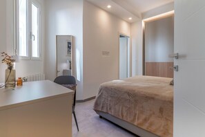 Fer et planche à repasser, Wi-Fi gratuit, draps fournis