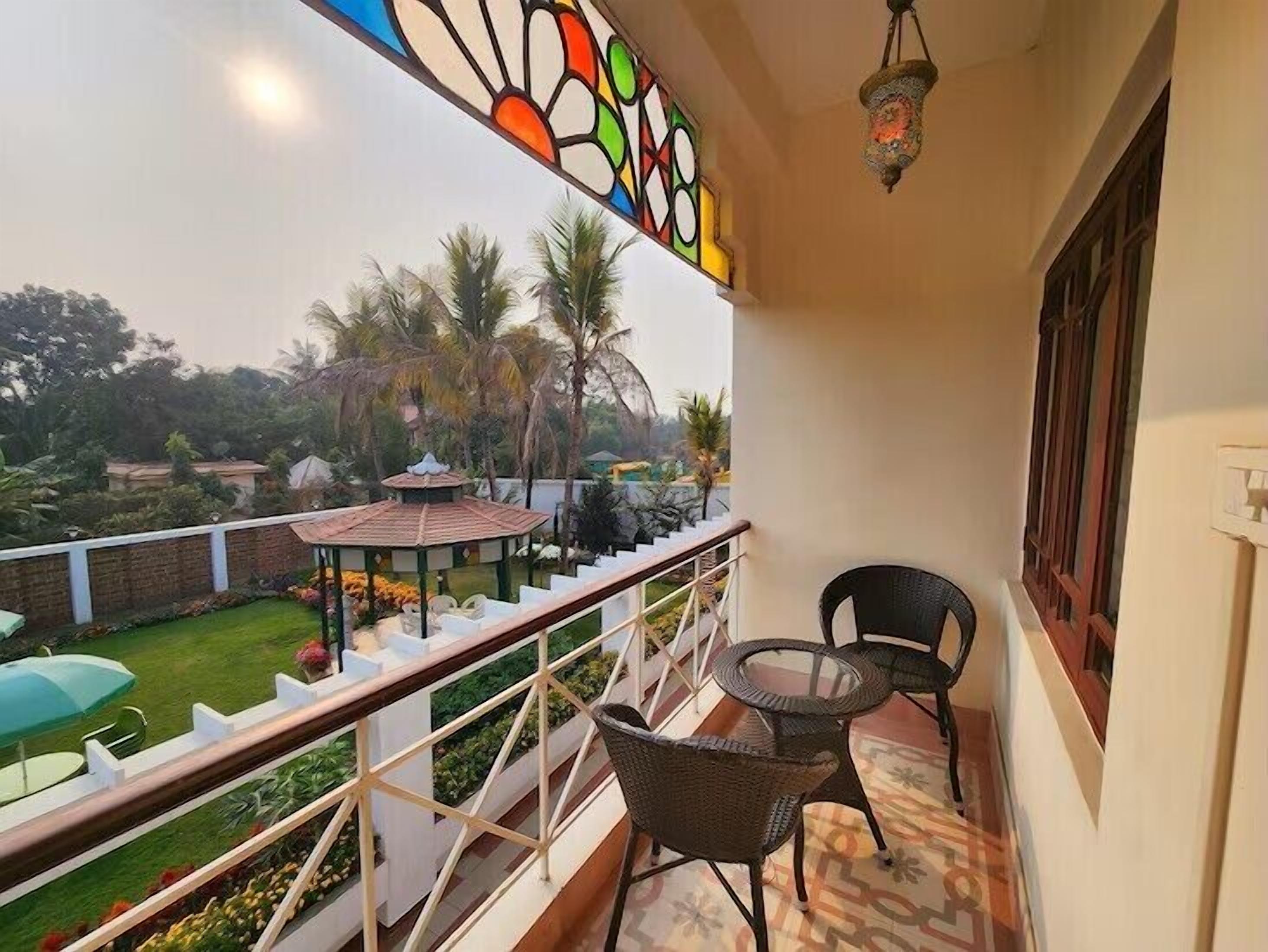 Deluxe Room, Balcony, Garden View | Balcony