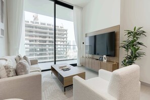 TV, offices - Luxury 1BR Haven - Prime Location - Newly Built (Dubai)
