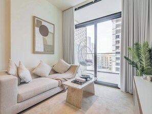 TV, offices - Luxury 1BR Haven in Binghatti Emerald - JVC (Dubai)
