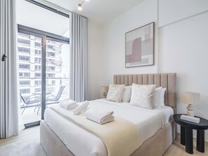 Iron/ironing board, WiFi, bed sheets - Luxury 1BR Haven in Binghatti Emerald - JVC (Dubai)