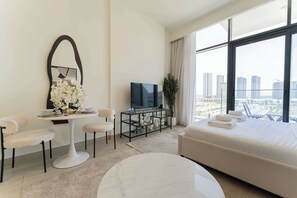Iron/ironing board, WiFi, bed sheets - Sleek & Cozy Studio - Central MBR City, Dubai (Dubai)