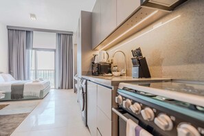 Fridge, microwave, oven, stovetop - Modern and Cozy Studio, Furnished, MBR Living (Dubai)