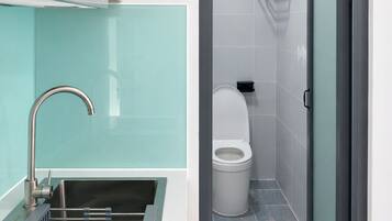 Shower, towels, toilet paper