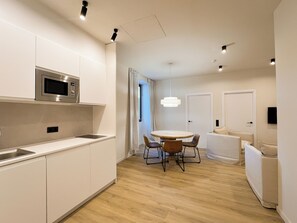 Family Apartment, 2 Bedrooms, Kitchen, City View | Down comforters, laptop workspace, free WiFi