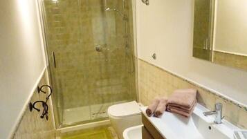 Hair dryer, towels, soap, toilet paper