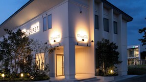 A modern building with the sign "YOKOTE LADIES PLAZA HOTEL" illuminated. - Hotel Ladies Plaza Yokote (Yokote)