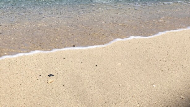 A beach with clear turquoise water and a sandy shore. - Chi Chi Nu Ji (Kunigami)