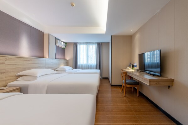 A hotel room with two beds, a desk with a television, and a window with curtains. - Winsome Hotel Guangzhou Tianhe Huajing Road Metro Branch (Guangzhou)