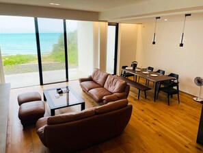 Living area - Beach Front Studio -nagonago- (Nago)
