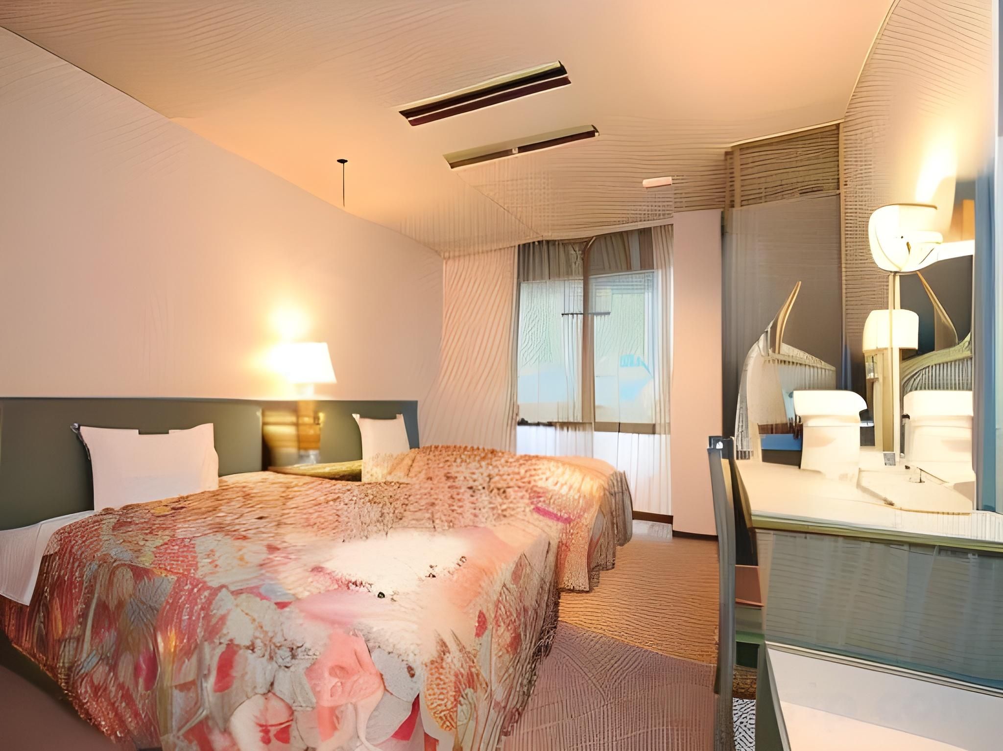 A hotel room with two beds, a large mirror, and a view of the outdoors.