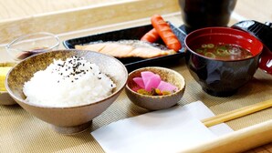 A traditional Japanese meal with rice, fish, vegetables, and soup. - Noblesse (Kobe)