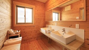 A wooden cabin bathroom with two sinks, a large mirror, and a window. - Cottage Oyumino (Chiba)
