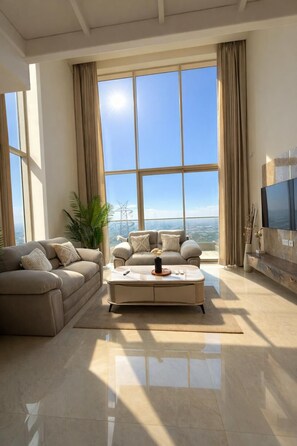 TV - Velantra Sky Duplex 
Luxury High-Rise Stay with Panoramic Views (Gurugram)