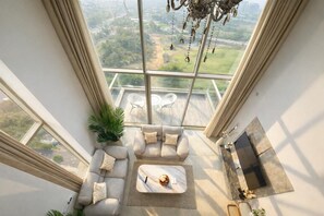 TV - Velantra Sky Duplex 
Luxury High-Rise Stay with Panoramic Views (Gurugram)