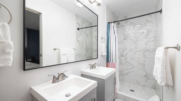 Hair dryer, towels, soap, toilet paper