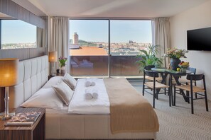 In-room safe, desk, laptop workspace, blackout drapes - Wenceslas Hotel & Apartments (Prague)