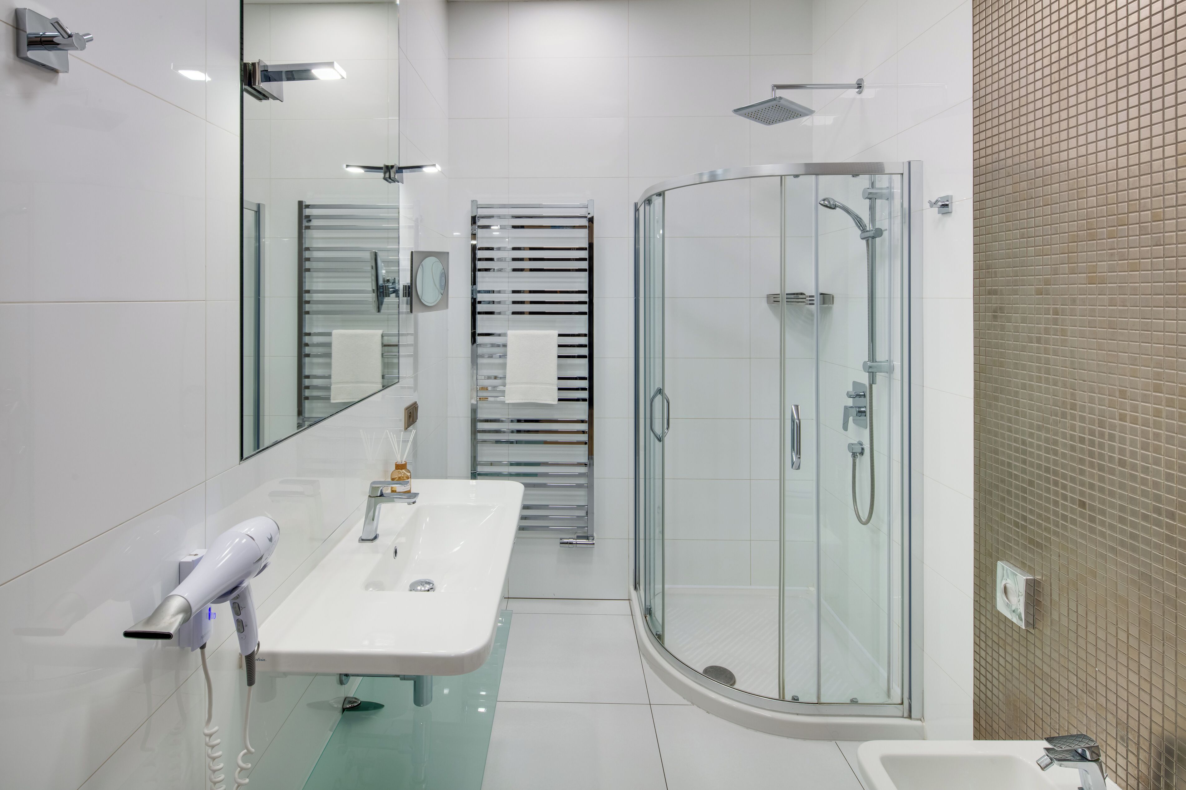 Shower, hair dryer, towels, toilet paper
