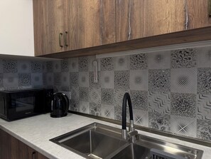 Appartement Familial, 2 chambres, cuisine, vue cour intérieure | Cuisine privée