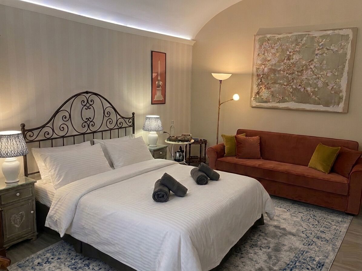 Deluxe Quadruple Room | Desk, laptop workspace, free WiFi