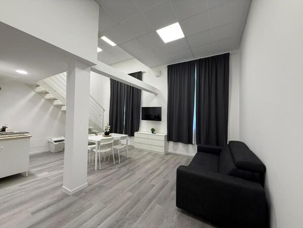 Deluxe Duplex | Living area | TV - Viva Residence (Calderara di Reno)