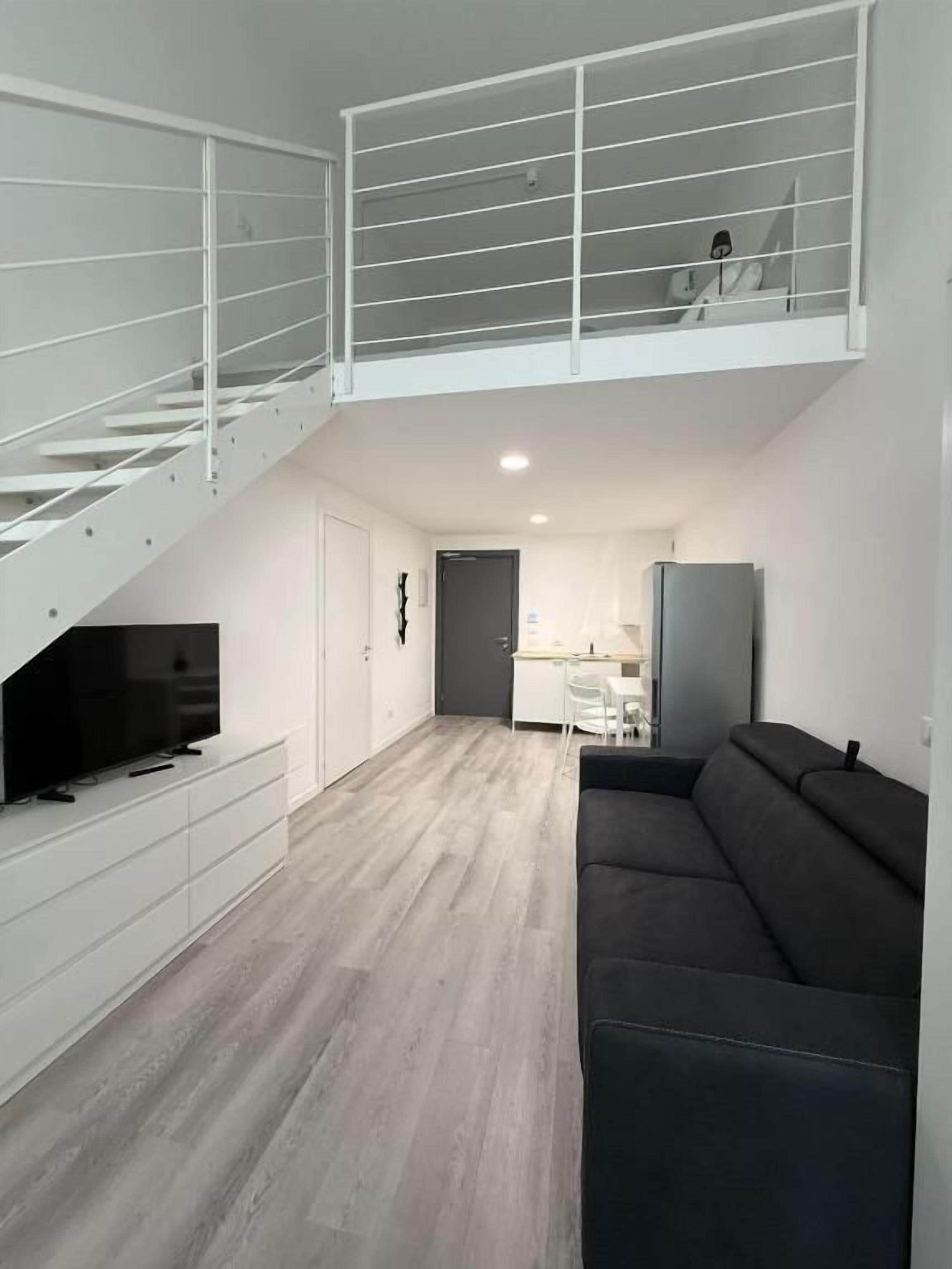 Deluxe Apartment | Living area | TV