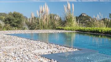 Indoor pool, seasonal outdoor pool, pool umbrellas, sun loungers