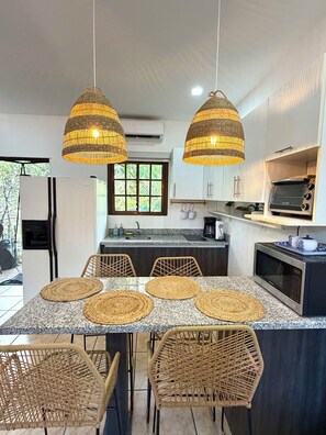 Fridge, microwave, stovetop, coffee/tea maker - Plaza Colonial Second Floor One Bedroom Unit (Playas Del Coco)