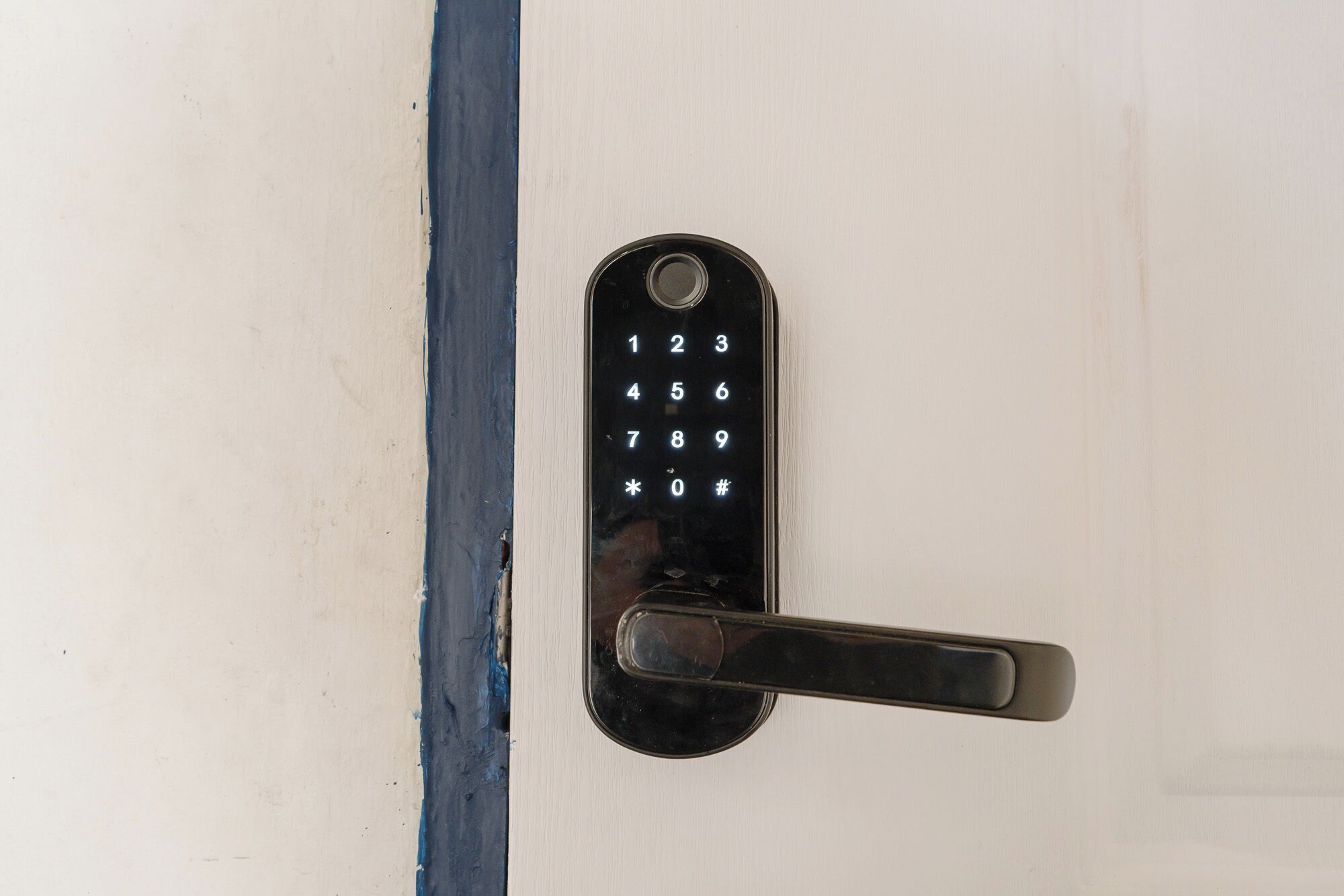 A door with a numeric keypad lock.