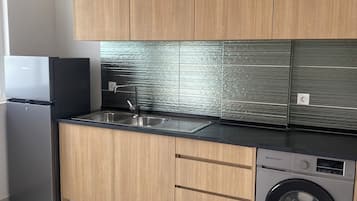 Appartamento, accesso in sedia a rotelle | Cucina privata | Frigorifero con congelatore, microonde