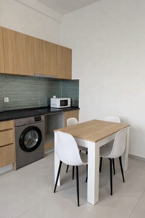 Apartment, Mobility Accessible | Private kitchen | Full-size fridge, microwave