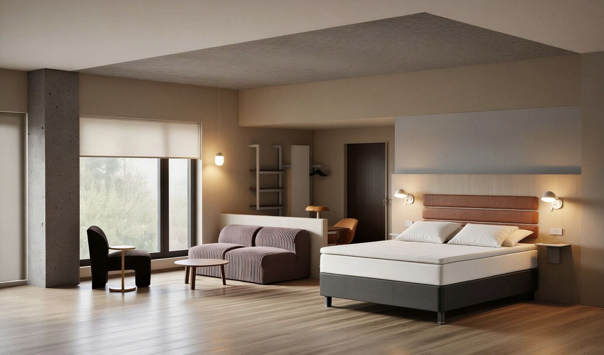 Une chambre d’hôtel moderne avec un grand lit, un bureau, une chaise et un canapé.