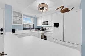 Fridge, microwave, oven, stovetop - Estero Cove 155. Island Vacation Condo, Gulf Views, Walk to Beach! (Fort Myers Beach)