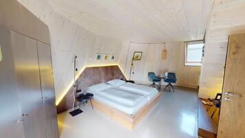 Deluxe-Suite, Gartenblick | Zimmersafe, Verdunkelungsvorhänge, kostenloses WLAN