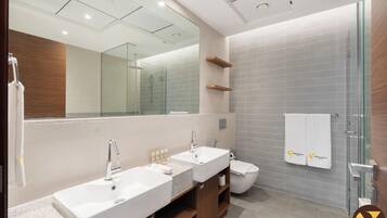 Luxury Apartment, Balcony, City View | Bathroom | Shower, free toiletries, hair dryer, slippers