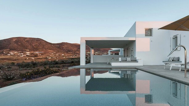 A modern house with a pool, a patio area, and a view of the countryside. - Golden Coast Villa Daphne Private Wadingpool Getaway (Paros)