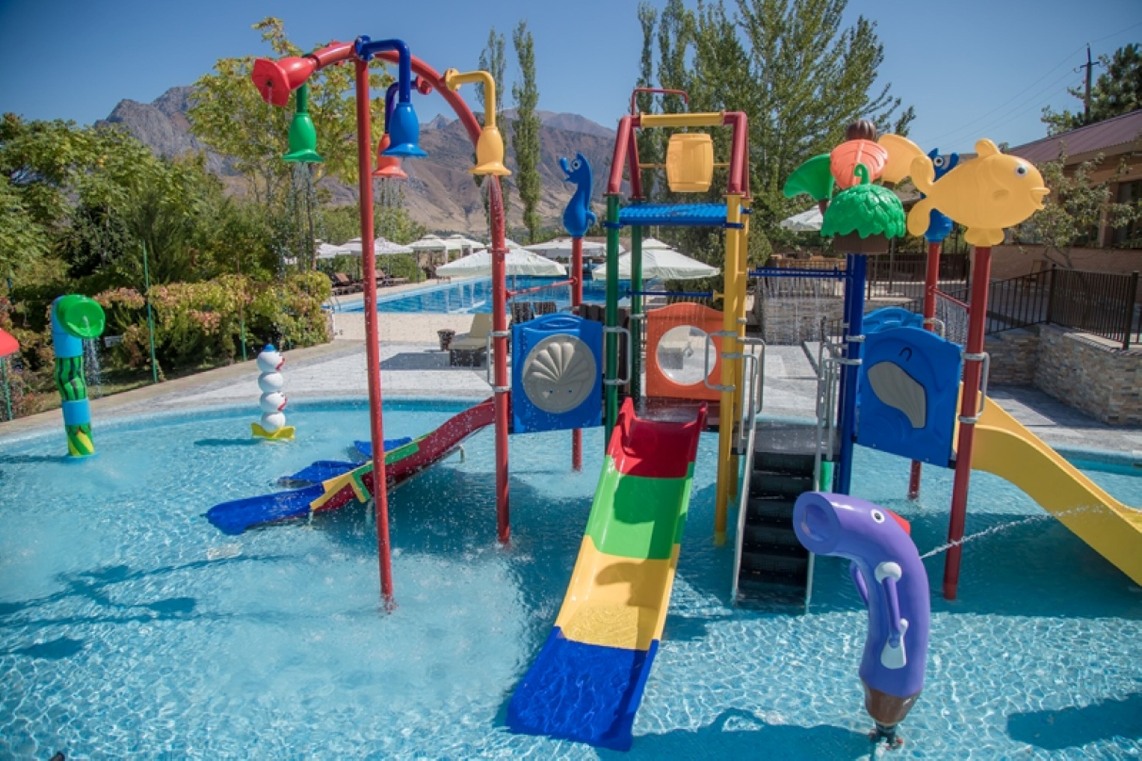 Seasonal outdoor pool, free pool cabanas, pool umbrellas