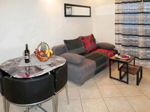 TV - One Bedroom Apartment with Shared Pool (Arbanija)