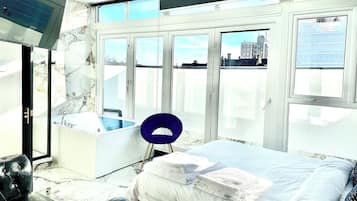 Desk, laptop workspace, blackout curtains, iron/ironing board