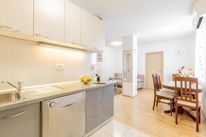 Unclassified image, 3 of 31, button - One Bedroom Apartment (Split)