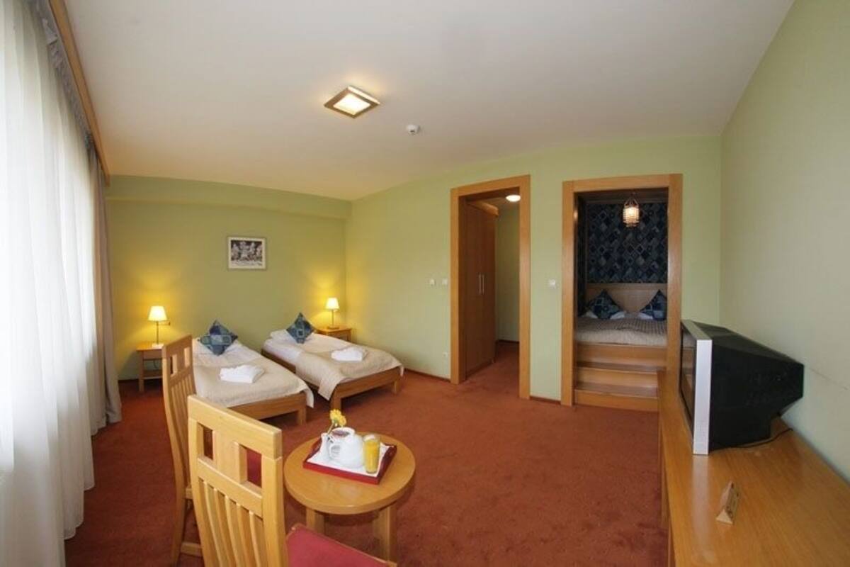 Family Quadruple Room, 1 Bedroom | In-room safe, laptop workspace, free WiFi, bed sheets