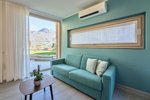 Appartement, vue lac | Coin séjour