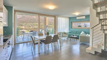 Deluxe Apartment, Lake View | Living area | Flat-screen TV