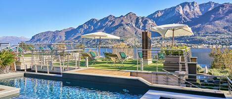 Seasonal outdoor pool, pool loungers