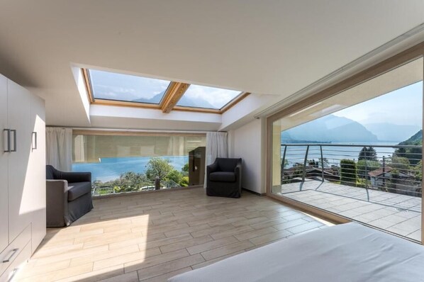 Deluxe Apartment, Lake View | In-room safe, blackout curtains, soundproofing, iron/ironing board