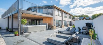 Lake Side Barn a premier conversion offers a masterclass in high-end coastal living.